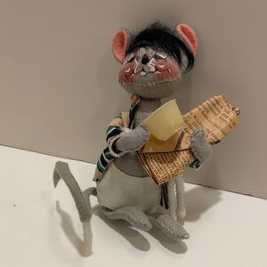 Annalee mouse, with morning paper and coffee-tea cup. 
1981 - 1965 edition.
